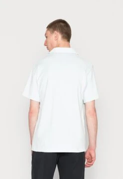 ARKET Polo Shirt - Turquoise -Arket UK Sales Store fb484c6d40294441bff0ed40bf54fa3b